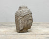 Klein stenen Buddha hoofdje