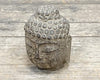 Klein stenen Buddha hoofdje
