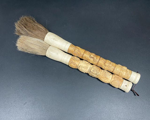 Carved bone handle brushes