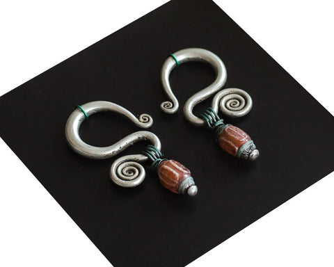 Antique large spiral earrings from the Miao minority - SERES Collection
 - 1