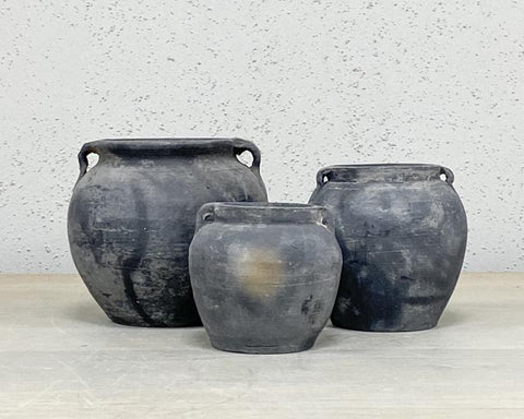 Set of rustic grey pots