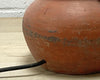 Kleine antieke terracotta potlamp